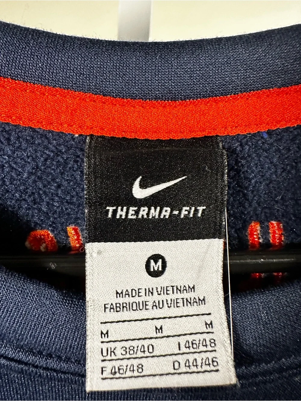 S182. Nike Men’s Navy Dri-FIT Pullover Sweatshirt with Red Logo